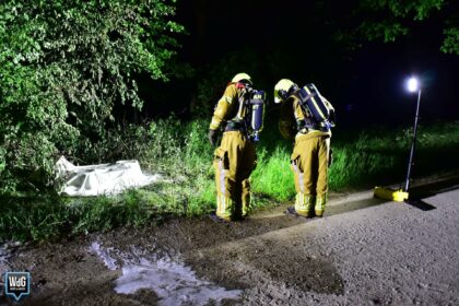 Gedumpte jerrycans in brand langs Kanaalweg bij Kelpen-Oler