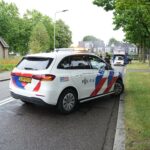 Rook uit lijnbus op Loverstraat in Nederweert