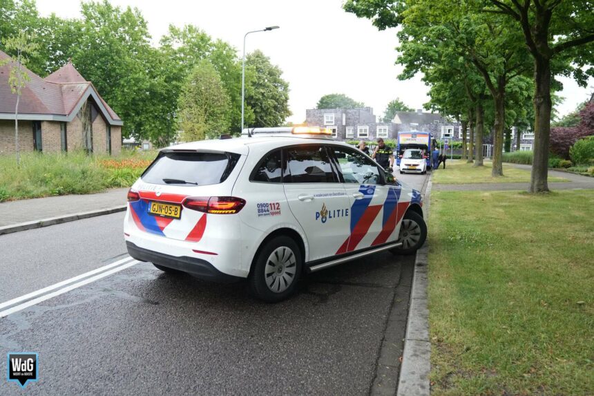 Rook uit lijnbus op Loverstraat in Nederweert