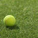 Tennis op kunstgras - Foto via depositphotos