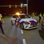 Politieauto botst met personenauto op Randweg Zuid in Nederweert
