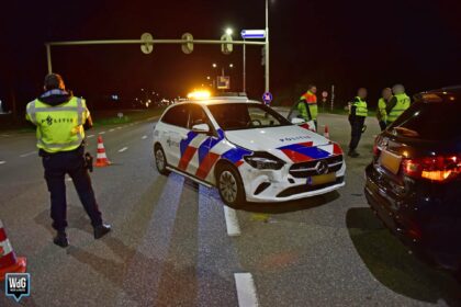 Politieauto botst met personenauto op Randweg Zuid in Nederweert