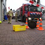 Brandweer pompt ondergelopen kelder leeg in Hoogstraat