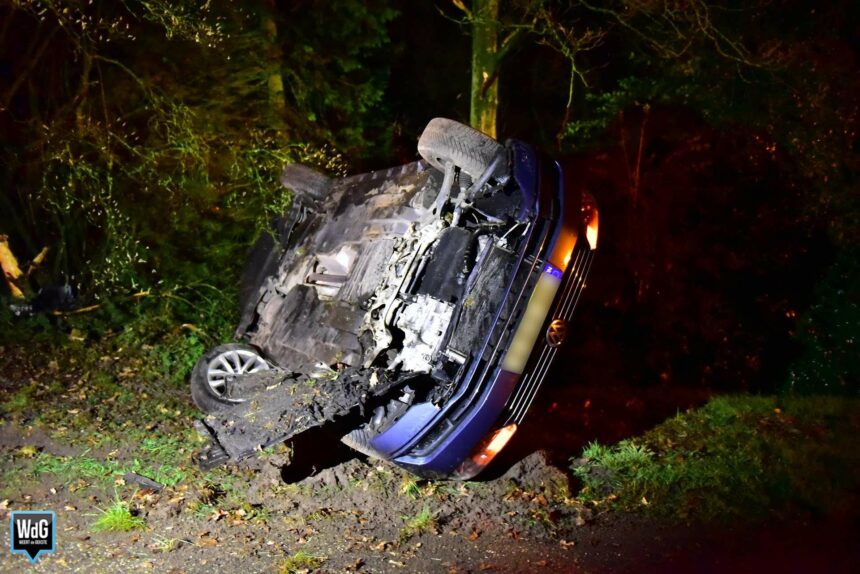 Auto mist bocht en komt op zijkant tot stilstand in Heythuysen