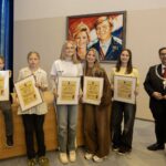 Jonge initiatiefnemers in het zonnetje gezet met kinderlintje