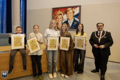 Jonge initiatiefnemers in het zonnetje gezet met kinderlintje