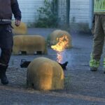 Brandweer blust brandje bij rookhok
