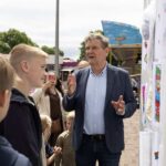 Wethouders Vestjens tijdens de kermis in Altweerterheide
